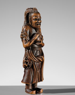 SHUZAN: A FINE TALL WOOD NETSUKE OF RYUJIN