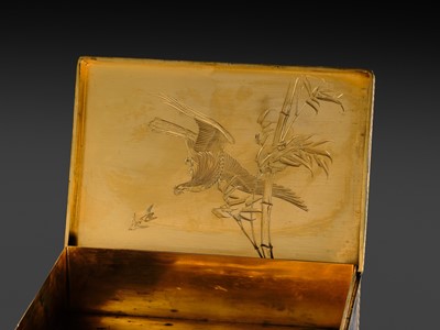 Lot 18 - KOMAI: A SUPERB GOLD-DAMASCENED IRON ‘PEACOCK AND PEAHEN’ BOX AND COVER