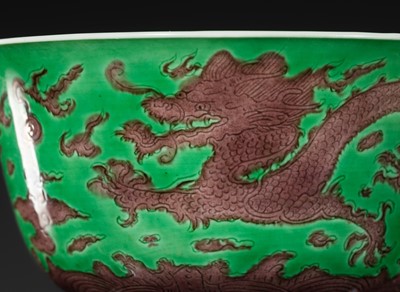 Lot 164 - THE ABSOLUTELY PERFECT 'J. J. LALLY' AUBERGINE AND GREEN-GLAZED ‘DRAGON’ BOWL, KANGXI MARK AND PERIOD