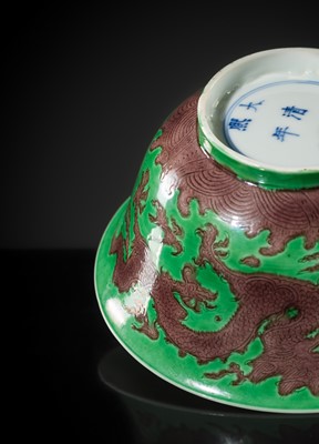 Lot 164 - THE ABSOLUTELY PERFECT 'J. J. LALLY' AUBERGINE AND GREEN-GLAZED ‘DRAGON’ BOWL, KANGXI MARK AND PERIOD