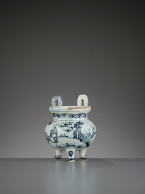 Lot 197 - A ‘WEIQI PLAYERS’ BLUE AND WHITE PORCELAIN TRIPOD CENSER, MING DYNASTY