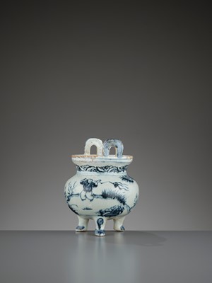 Lot 197 - A ‘WEIQI PLAYERS’ BLUE AND WHITE PORCELAIN TRIPOD CENSER, MING DYNASTY