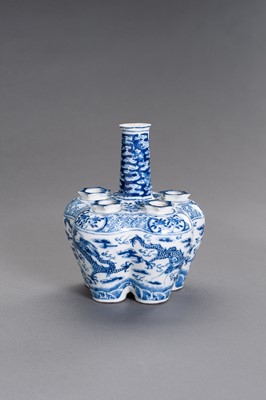 Lot 390 - A BLUE AND WHITE PORCELAIN ‘DRAGONS’ TULIP VASE, QING DYNASTY