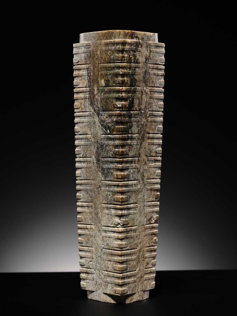 Lot 69 - A LARGE AND IMPORTANT ELEVEN-TIERED JADE CONG, NEOLITHIC PERIOD, LIANGZHU CULTURE