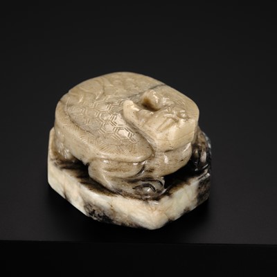 Lot 117 - A RARE WHITE AND BLACK JADE SEAL WITH A DRAGON-TORTOISE (XUANWU), MING DYNASTY