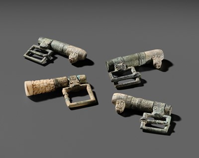 Lot 59 - A GROUP LOT WITH FOUR RARE JADE AND BRONZE HARNESS ELEMENTS, EASTERN ZHOU DYNASTY
