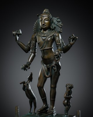 Lot 343 - A BRONZE FIGURE OF SHIVA BHIKSHATANA, TAMIL NADU, 19TH-EARLY 20TH CENTURY