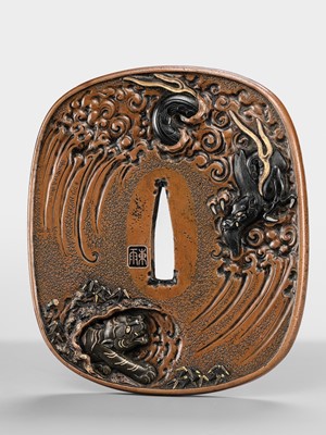 Lot 57 - TSUCHIYA YASUCHIKA V: A LARGE AND SUPERB SUAKA ‘DRAGON’ TSUBA