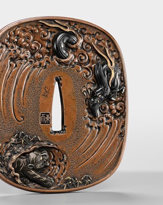 Lot 57 - TSUCHIYA YASUCHIKA V: A LARGE AND SUPERB SUAKA ‘DRAGON’ TSUBA