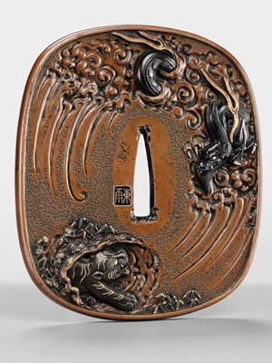 Lot 57 - TSUCHIYA YASUCHIKA V: A LARGE AND SUPERB SUAKA ‘DRAGON’ TSUBA