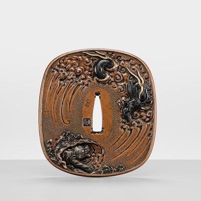 Lot 57 - TSUCHIYA YASUCHIKA V: A LARGE AND SUPERB SUAKA ‘DRAGON’ TSUBA