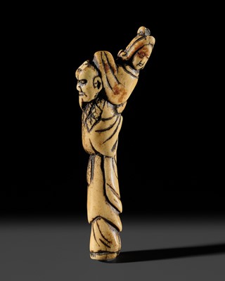 A LARGE ANTLER NETSUKE OF IKKAKU SENNIN CARRYING THE LADY OF BENARES