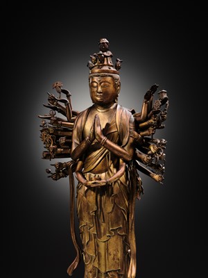 Lot 107 - A HIGHLY IMPORTANT AND EXCEEDINGLY RARE GILT-BRONZE FIGURE OF SENJU KANNON, THE THOUSAND-ARMED AND ELEVEN-HEADED AVALOKITESHVARA, C. 1300-1450