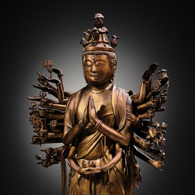 Lot 107 - A HIGHLY IMPORTANT AND EXCEEDINGLY RARE GILT-BRONZE FIGURE OF SENJU KANNON, THE THOUSAND-ARMED AND ELEVEN-HEADED AVALOKITESHVARA, C. 1300-1450