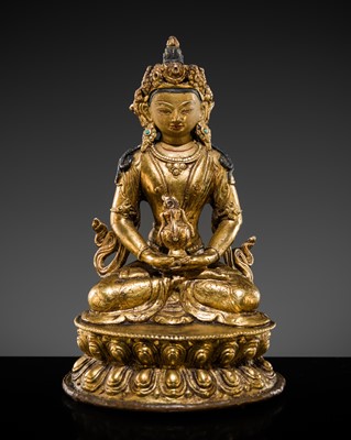 Lot 68 - AN INLAID GILT-BRONZE FIGURE OF AMITAYUS, TIBET, 19TH-EARLY 20TH CENTURY