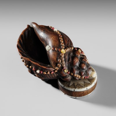 A RARE TOKYO SCHOOL INLAID WOOD NETSUKE OF A HORAGAI CONCH AND DRUM