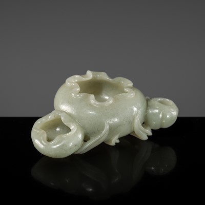 Lot 225 - A PALE CELADON JADE ‘LOTUS’ DOUBLE BRUSHWASHER, BIXI, 18TH-19TH CENTURY