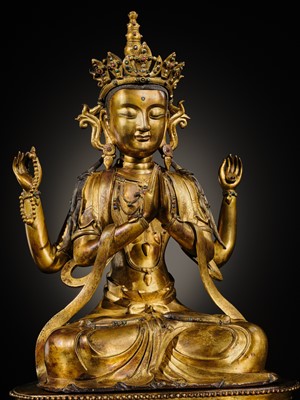 Lot 75 - A LARGE AND FINELY INLAID SINO-TIBETAN GILT-BRONZE FIGURE OF THE FOUR-ARMED GUANYIN, SHADAKSHARI LOKESHVARA, MING DYNASTY, 16TH TO EARLY 17TH CENTURY
