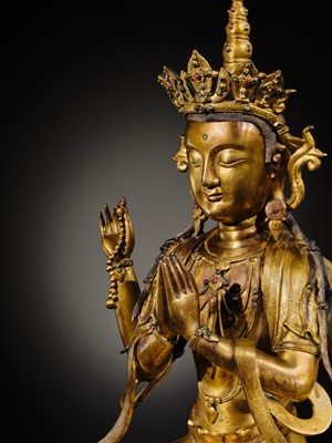 Lot 75 - A LARGE AND FINELY INLAID SINO-TIBETAN GILT-BRONZE FIGURE OF THE FOUR-ARMED GUANYIN, SHADAKSHARI LOKESHVARA, MING DYNASTY, 16TH TO EARLY 17TH CENTURY