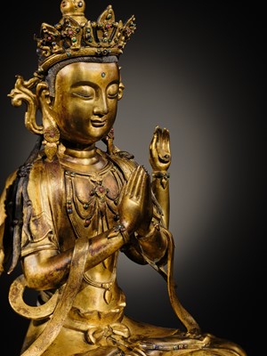 Lot 75 - A LARGE AND FINELY INLAID SINO-TIBETAN GILT-BRONZE FIGURE OF THE FOUR-ARMED GUANYIN, SHADAKSHARI LOKESHVARA, MING DYNASTY, 16TH TO EARLY 17TH CENTURY