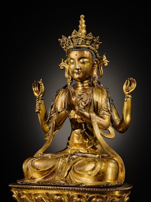 Lot 75 - A LARGE AND FINELY INLAID SINO-TIBETAN GILT-BRONZE FIGURE OF THE FOUR-ARMED GUANYIN, SHADAKSHARI LOKESHVARA, MING DYNASTY, 16TH TO EARLY 17TH CENTURY
