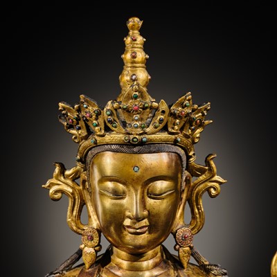 Lot 75 - A LARGE AND FINELY INLAID SINO-TIBETAN GILT-BRONZE FIGURE OF THE FOUR-ARMED GUANYIN, SHADAKSHARI LOKESHVARA, MING DYNASTY, 16TH TO EARLY 17TH CENTURY