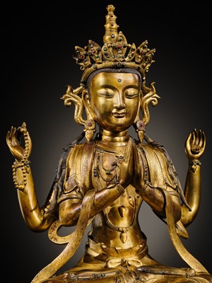 Lot 75 - A LARGE AND FINELY INLAID SINO-TIBETAN GILT-BRONZE FIGURE OF THE FOUR-ARMED GUANYIN, SHADAKSHARI LOKESHVARA, MING DYNASTY, 16TH TO EARLY 17TH CENTURY