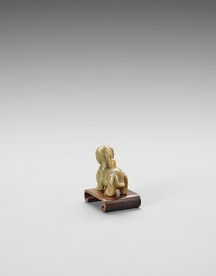 Lot 774 - A JADE CARVING OF A BIXIE