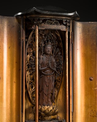 A GILT-LACQUERED WOOD ZUSHI (PORTABLE BUDDHIST SHRINE) CONTAINING A VERY FINE FIGURE OF JUICHIMEN KANNON (THE 11-HEADED KANNON), 18TH CENTURY