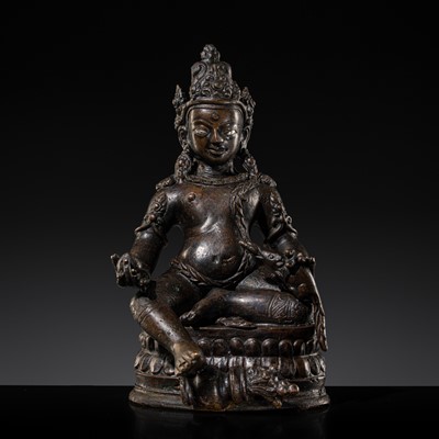 Lot 62 - A SILVER-INLAID BRONZE FIGURE OF JAMBHALA, TIBET, 18TH-19TH CENTURY