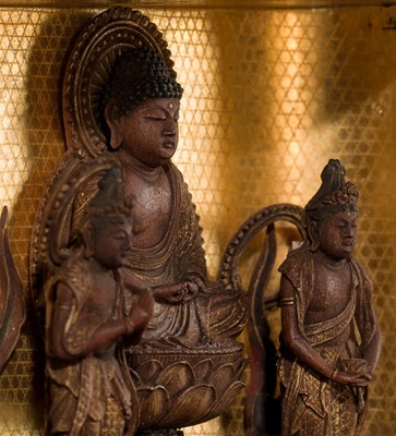 A MINIATURE GILT-LACQUERED WOOD ZUSHI (PORTABLE BUDDHIST SHRINE) WITH A FINE AMIDA TRIAD, EDO PERIOD