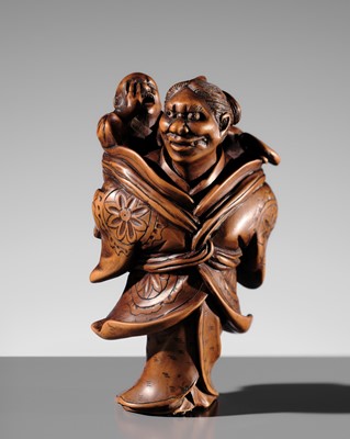 KAHO: A SUPERB MASAKA SCHOOL WOOD OKIMONO OF A DEMON AND CHILD