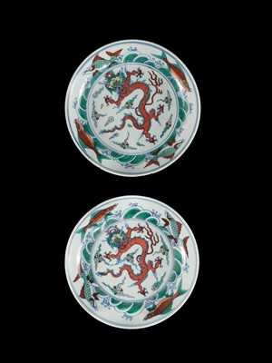 Lot 174 - A PAIR OF DOUCAI 'DRAGON AND CARP' DISHES, YONGZHENG MARKS AND PERIOD