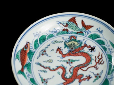 Lot 174 - A PAIR OF DOUCAI 'DRAGON AND CARP' DISHES, YONGZHENG MARKS AND PERIOD