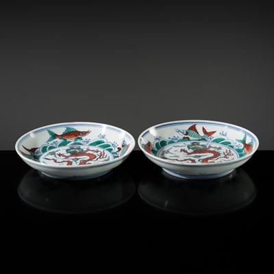 Lot 174 - A PAIR OF DOUCAI 'DRAGON AND CARP' DISHES, YONGZHENG MARKS AND PERIOD