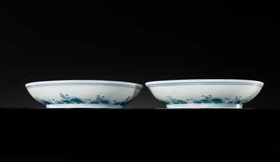 Lot 174 - A PAIR OF DOUCAI 'DRAGON AND CARP' DISHES, YONGZHENG MARKS AND PERIOD