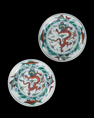Lot 174 - A PAIR OF DOUCAI 'DRAGON AND CARP' DISHES, YONGZHENG MARKS AND PERIOD