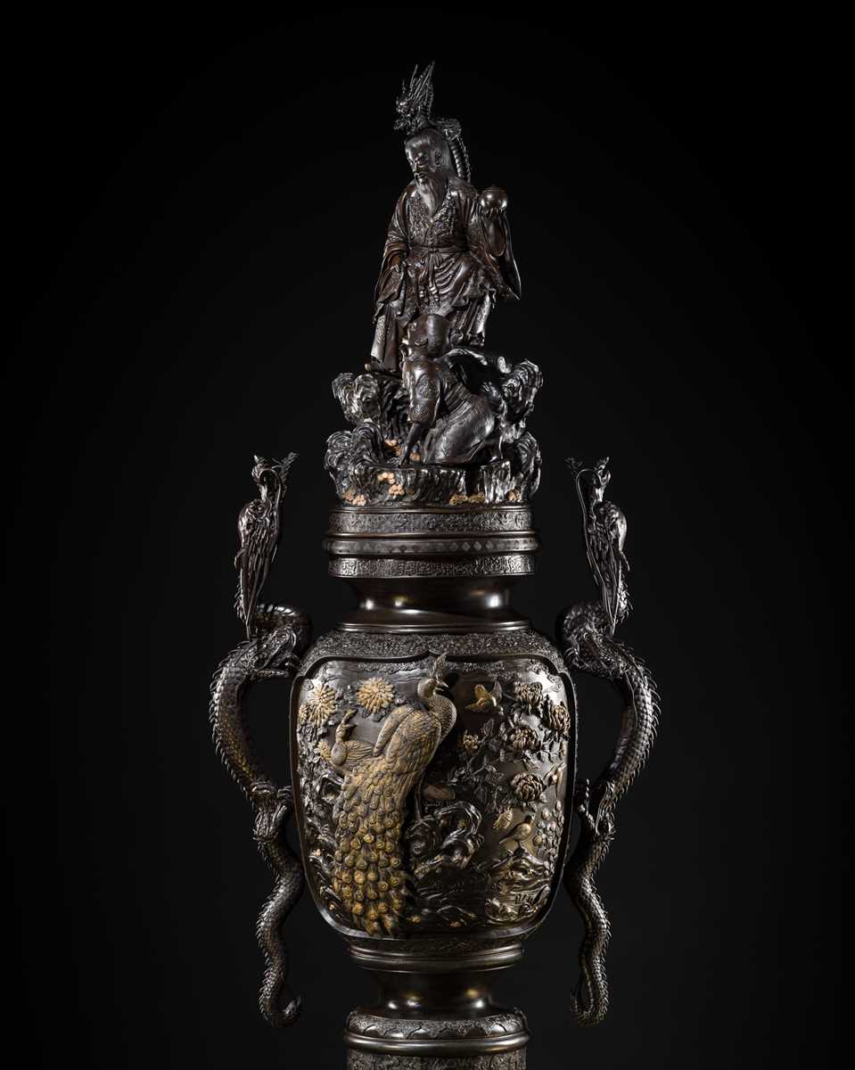 Lot 4 - HAYASHI HARUSADA: A MONUMENTAL (234 CM) PARCEL-GILT BRONZE ‘RYUJIN AND DRAGONS’ EXHIBITION KORO (INCENSE BURNER)