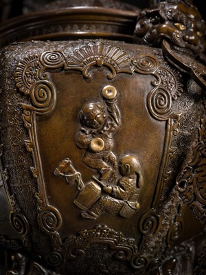 Lot 3 - HAYASHI HARUSADA: A MONUMENTAL (177 CM) PARCEL-GILT BRONZE ‘AUSPICIOUS ANIMALS’ EXHIBITION KORO (INCENSE BURNER)