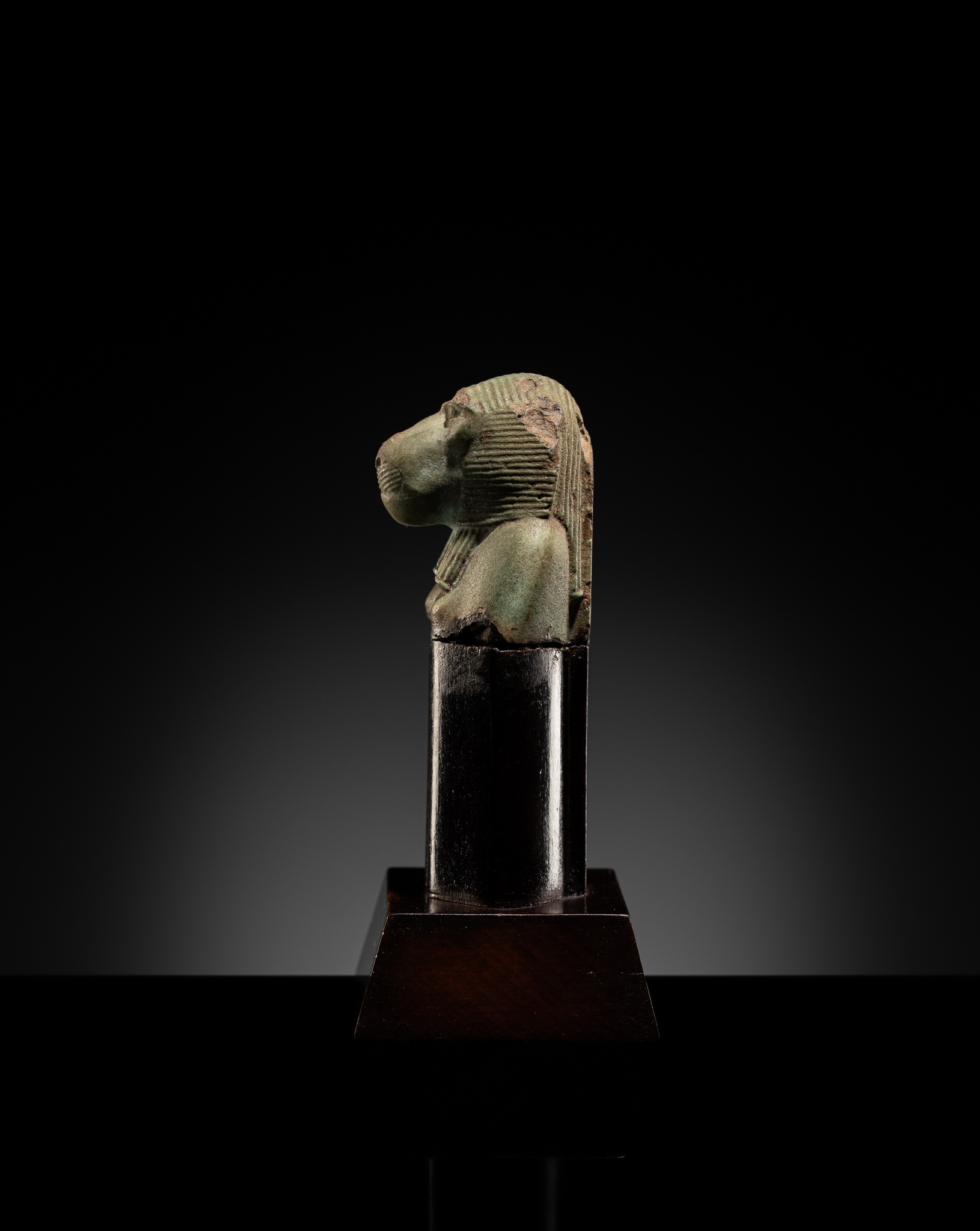 Baboon Win Lot 60 - A FINE AND UNUSUAL GREEN FAIENCE FRAGMENT OF