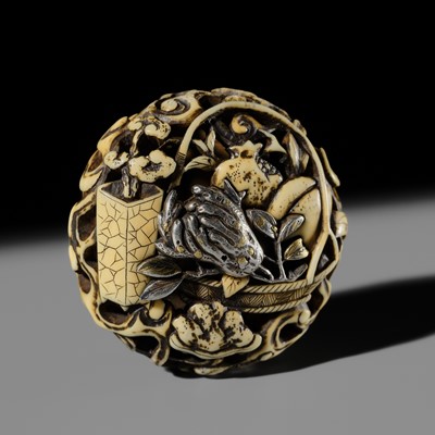 KO: A FINE SILVER INLAID WALRUS TUSK RYUSA MANJU NETSUKE WITH AUSPICIOUS FRUITS