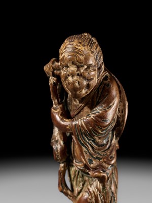 Lot 100 - A POWERFUL SAISHIKI NETSUKE OF TEKKAI SENNIN, STYLE OF YOSHIMURA SHUZAN