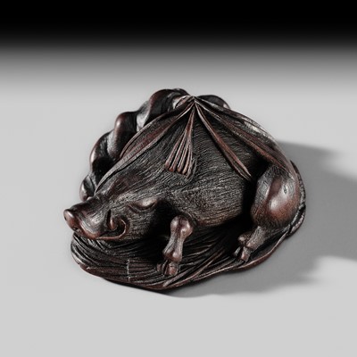 JUGYOKU: A FINE WOOD NETSUKE OF A BOAR SLEEPING AMONG AUTUMN GRASSES