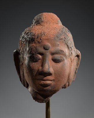 Lot 321 - A RARE TERRACOTTA HEAD OF BUDDHA, GUPTA PERIOD, CIRCA 3RD-5TH CENTURY