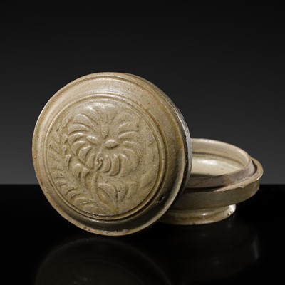 Lot 249 - A YUEYAO CARVED AND MOLDED CELADON ‘CHRYSANTHEMUM’ BOX AND COVER, NORTHERN SONG DYNASTY
