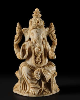 Lot 354 - A FINE IVORY FIGURE OF GANESHA, 19TH CENTURY