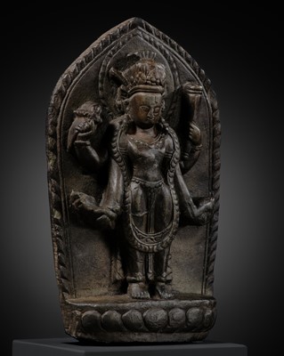 Lot 53 - A STONE STELE OF VISHNU, LATE MALLA, THREE KINGDOMS PERIOD