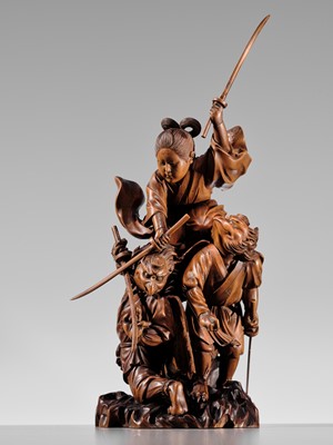Lot 184 - HIKATA SESSHU: AN EXCEPTIONAL AND LARGE CARVED WOOD ‘MINAMOTO NO YOSHITSUNE TRAINING WITH THE TENGU’ OKIMONO