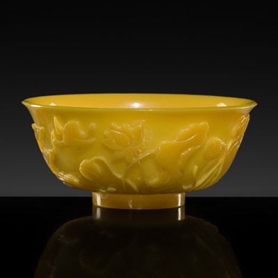 Lot 168 - A CARVED YELLOW GLASS BOWL, QIANLONG MARK, 18TH-19TH CENTURY