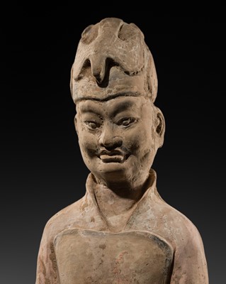 Lot 242 - A LARGE PAINTED POTTERY FIGURE OF A COURT OFFICIAL, TANG DYNASTY